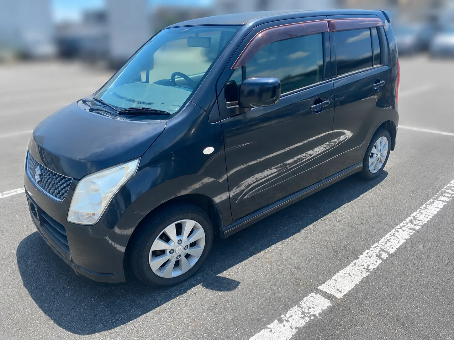 4代目で型式MH23Sに該当する黒いワゴンRのフロントと側面